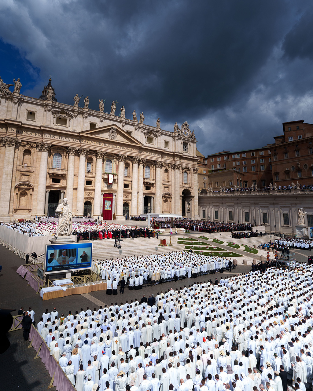 Inauguration Mass of His Holiness Pope Leo XIV at Saint Peter’s Square, rows of seats filled with worshippers in white face a stage. Inauguration Mass of His Holiness Pope Leo XIV at Saint Peter’s Square, rows of seats filled with worshippers in white face a stage.