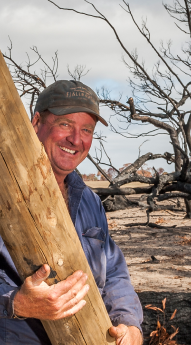 Man holding a log