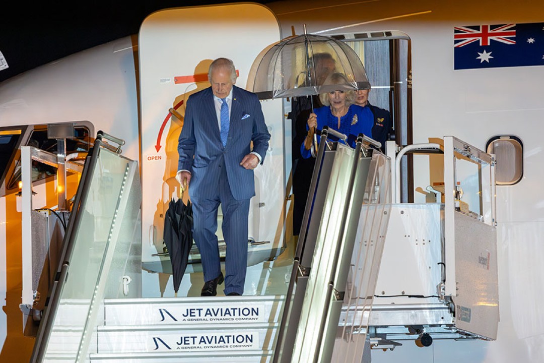 Their Majesties Camilla exiting a plane.