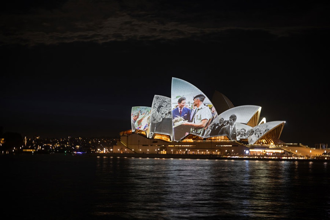 Sydney Opera House with images from The King's previous visits to Australia projected on its sails.