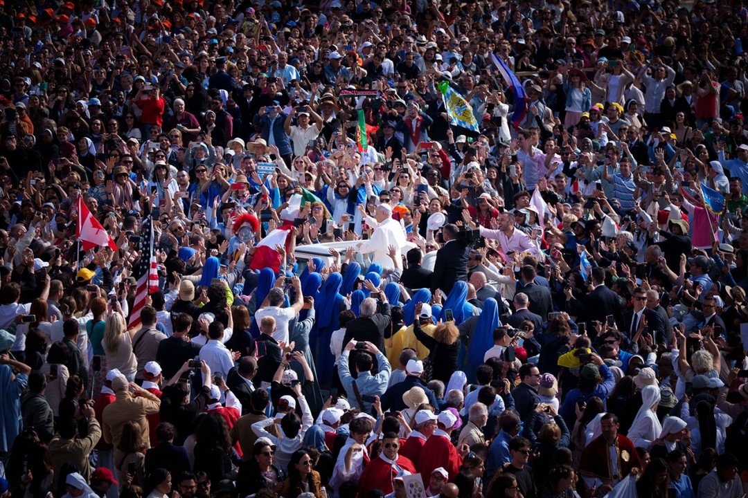 Inauguration Mass of His Holiness Pope Leo XIV at Saint Peter’s Square. People waving flags from different nations gather around Pope Leo XIV.