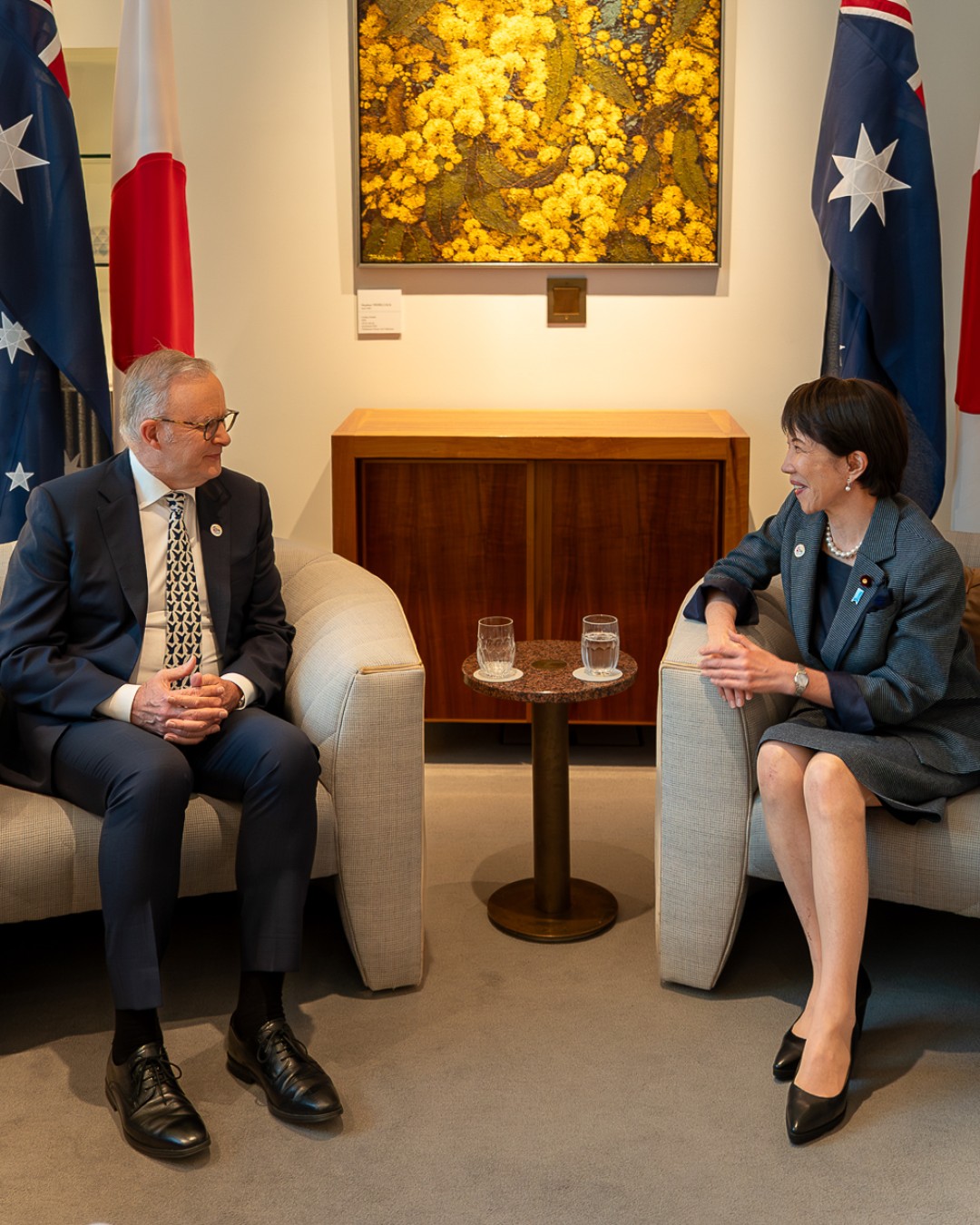 Prime Minister Anthony Albanese and Prime Minister of Japan Sanae Takaichi seated together during a bilateral meeting.