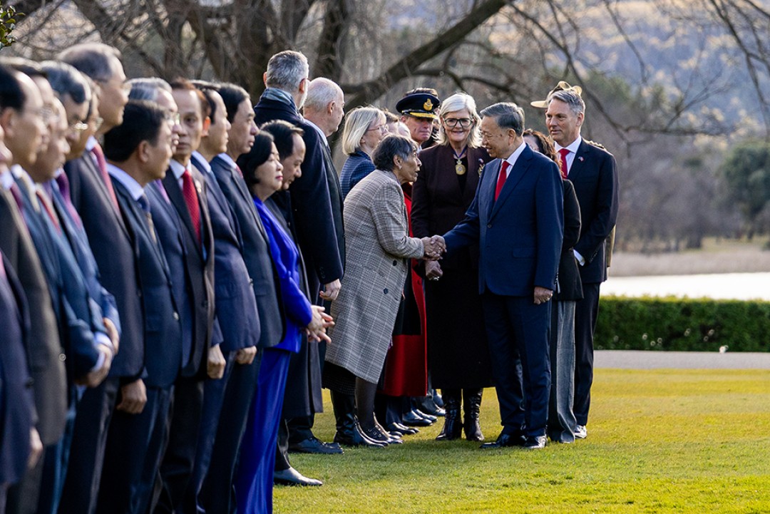 Her Excellency the Honourable Ms Sam Mostyn AC, Governor-General of the Commonwealth of Australia, welcomes General Secretary and President of the Socialist Republic of Vietnam To Lam during a Welcome Ceremony on the lawn at Government House.