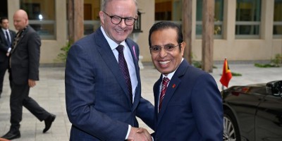 Prime Minister Anthony Albanese and Prime Minister Taur Matan Ruak smile and shake hands